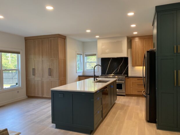 green and gold cabinets with wood cabinets in high end kitchen